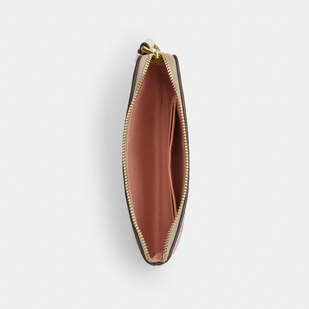 Coach Corner Zip Wristlet In Signature Canvas With Floral Print Gold Sand Multi