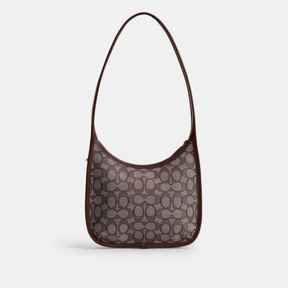 Coach Curve Zip Bag In Signature Jacquard Brass Oak Maple