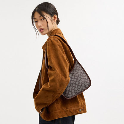 Coach Curve Zip Bag In Signature Jacquard Brass Oak Maple