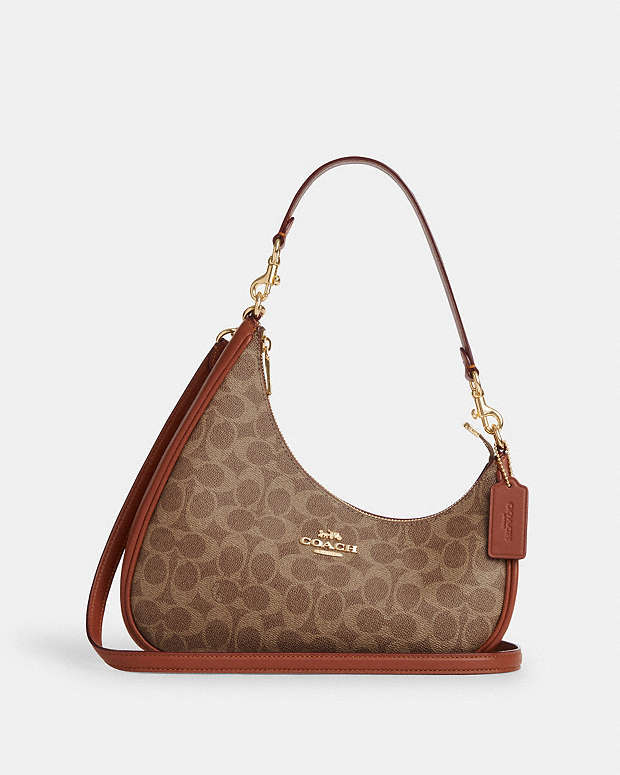 Twisted Teri Shoulder Bag In Signature Canvas Signature Canvas-Im-Tan-Caramel Signature Canvas-Im-Tan-Caramel