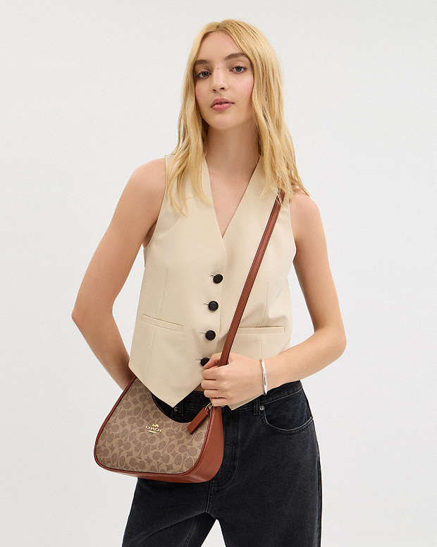 Twisted Teri Shoulder Bag In Signature Canvas Signature Canvas-Im-Tan-Caramel Signature Canvas-Im-Tan-Caramel