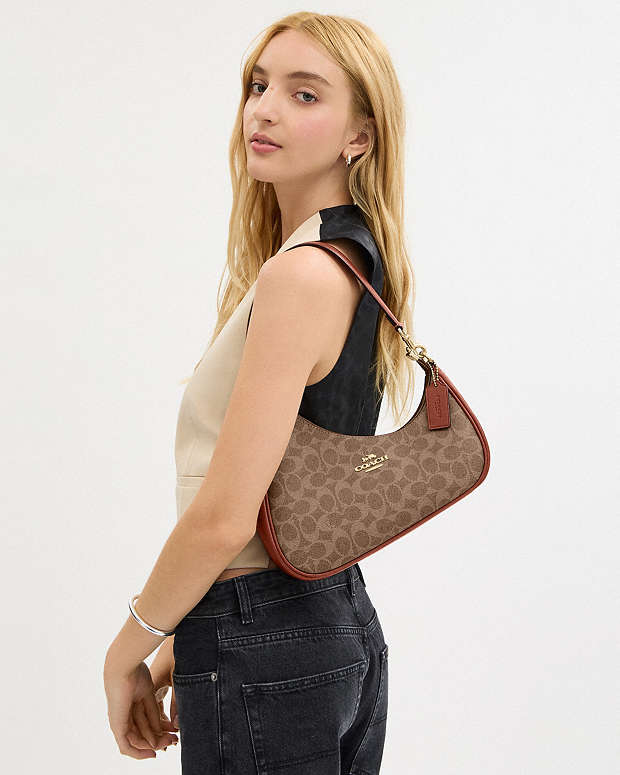 Twisted Teri Shoulder Bag In Signature Canvas Signature Canvas-Im-Tan-Caramel Signature Canvas-Im-Tan-Caramel