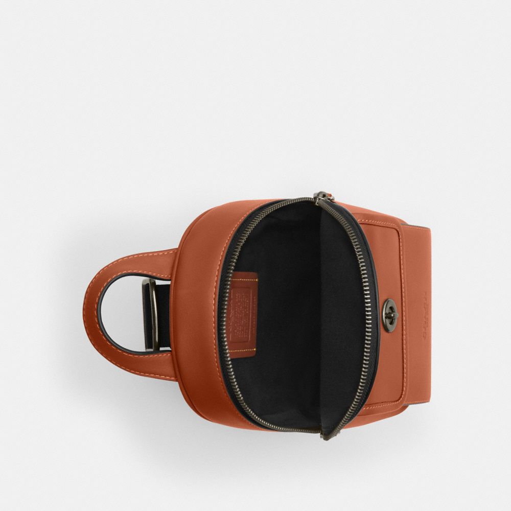 Coach Small Turnlock Sling Pack Gunmetal Tan