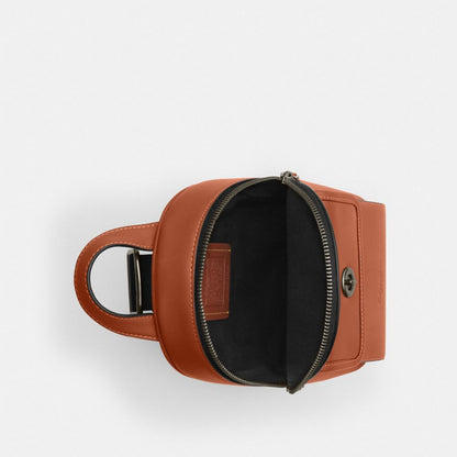 Coach Small Turnlock Sling Pack Gunmetal Tan