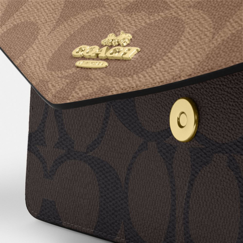 Coach Klare Envelope Crossbody Bag In Blocked Signature Canvas Gold Walnut Tan