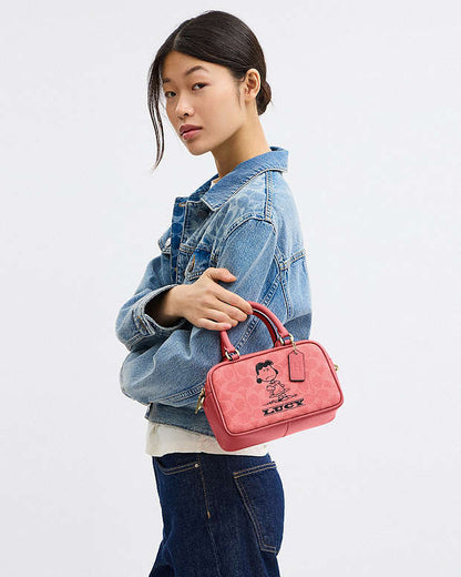 Coach X Peanuts Satchel Crossbody Bag In Signature Canvas With Lucy Signature Canvas-Im-Bright Coral Multi Signature Canvas-Im-Bright Coral Multi