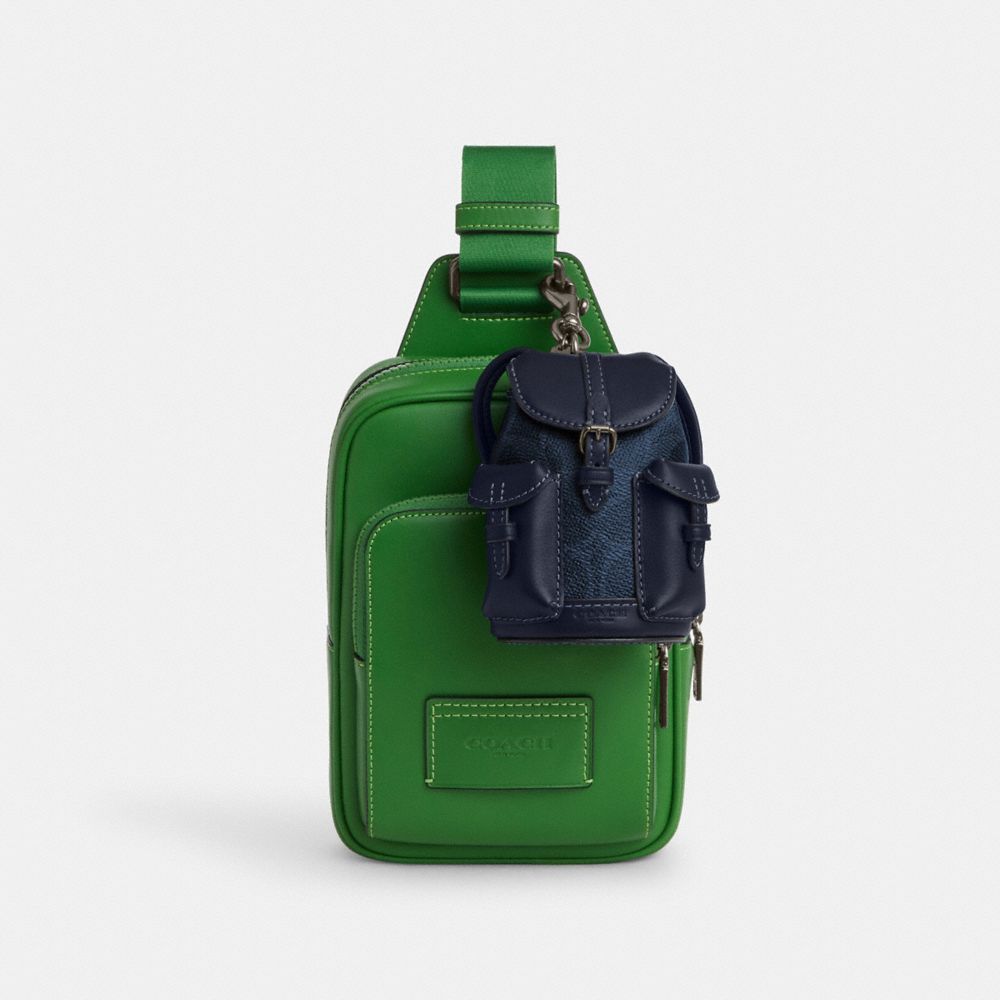 Coach Mini Warner Backpack Bag Charm In Signature Canvas Gunmetal Denim Midnight Navy