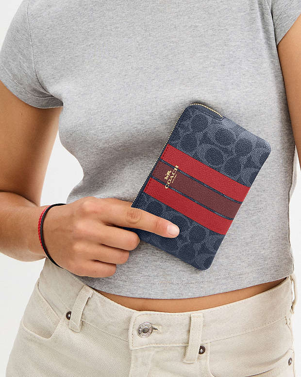 Corner Zip Wristlet In Signature Canvas With Varsity Stripe Im-Denim-Bold Red Im-Denim-Bold Red