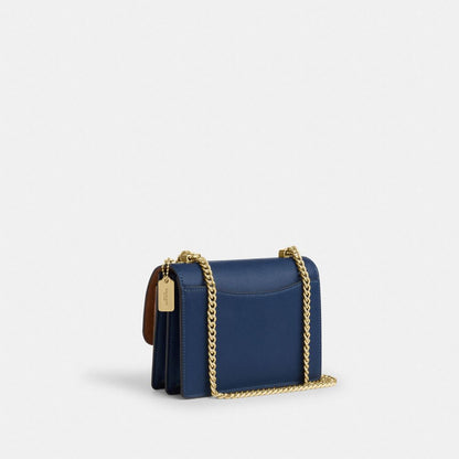 Coach Mini Klare Crossbody Bag In Signature Canvas Im Deep Blue Tan