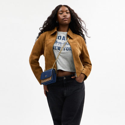 Coach Mini Klare Crossbody Bag In Signature Canvas Im Deep Blue Tan