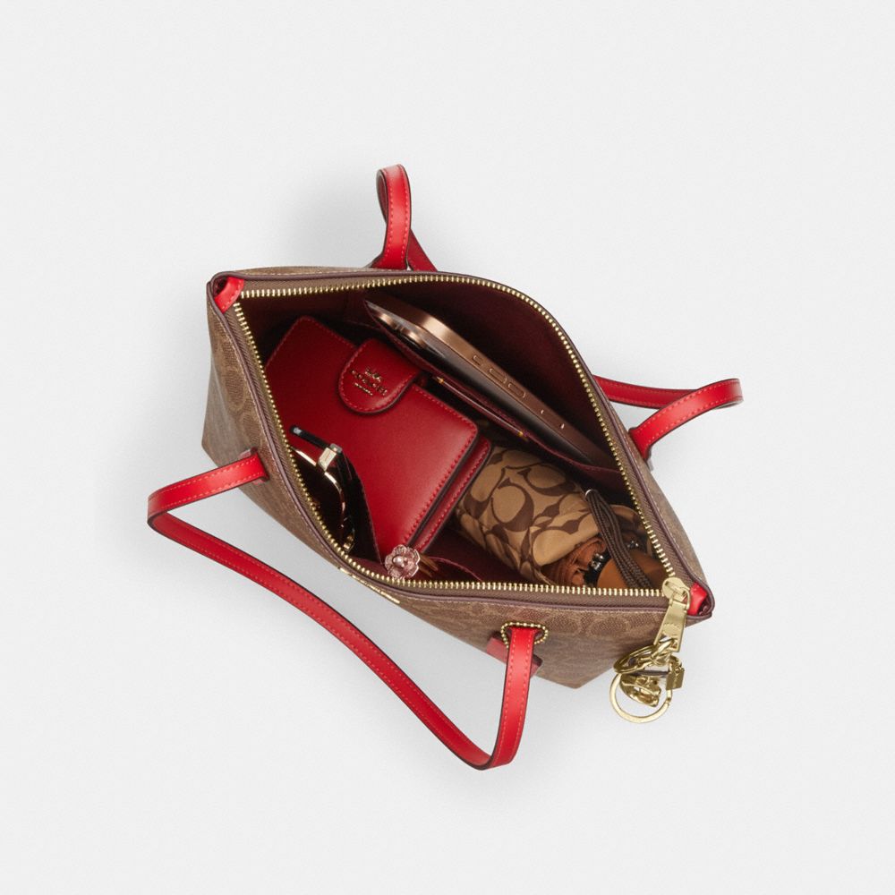 Coach Fiona Zip Tote Bag In Signature Canvas Gold Tan Carnation