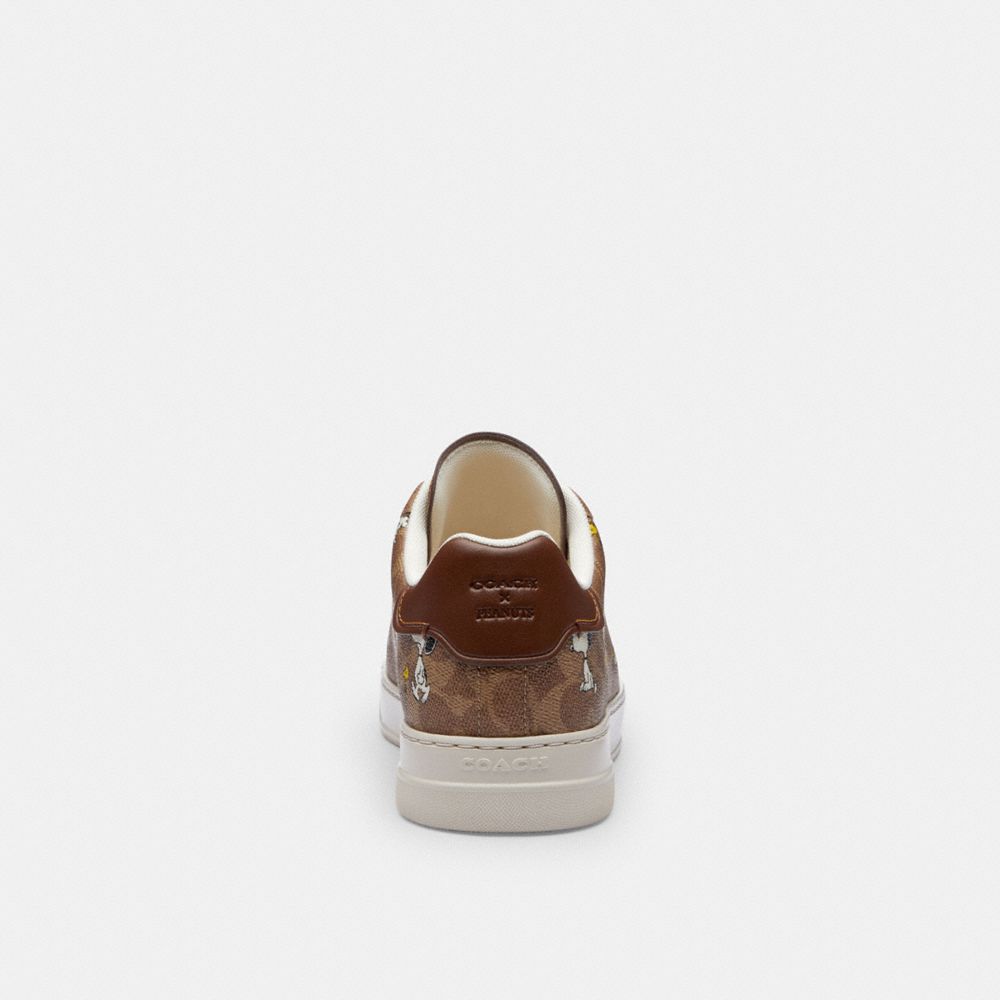 Coach Coach X Peanuts High Line Sneaker In Signature Canvas With Snoopy Print Tan
