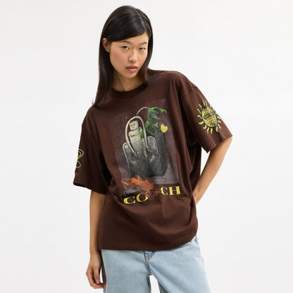 Coach Coach Graphic Relaxed T Shirt In Organic Cotton Brown