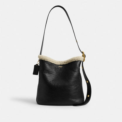 Coach Bleecker Bucket Bag In Shearling Brass Black Natural