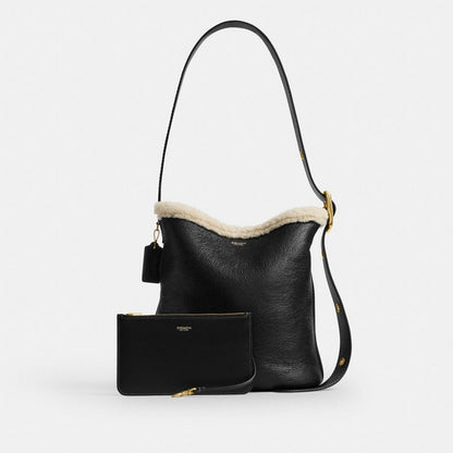 Coach Bleecker Bucket Bag In Shearling Brass Black Natural