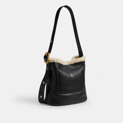 Coach Bleecker Bucket Bag In Shearling Brass Black Natural