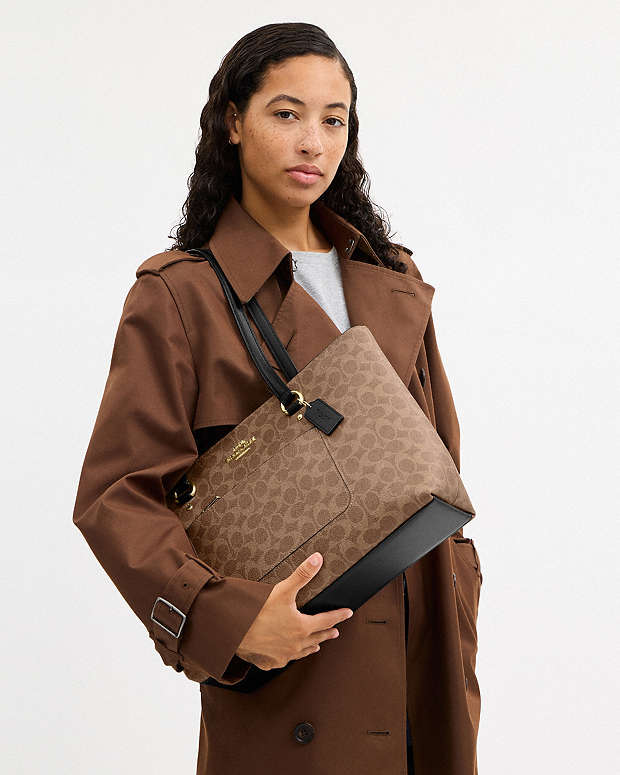Station Tote Bag In Signature Canvas Signature Canvas-Gold-Tan-Black Signature Canvas-Gold-Tan-Black