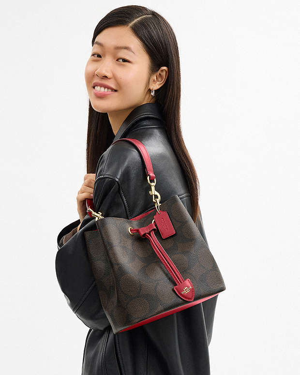 Rowan Bucket Bag In Maxi Signature Canvas Signature Canvas-Im-Walnut-True Red Signature Canvas-Im-Walnut-True Red