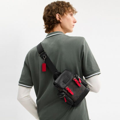 Coach Sprint Sling Pack In Signature Canvas Qb Walnut Bold Red