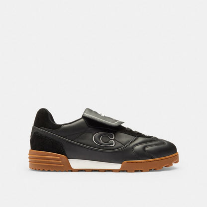 Coach Match Sneaker black toe box and suede detail close-up
