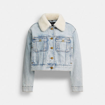 Coach Cropped Heritage C Denim Trucker Jacket In Organic Cotton With Shearling Collar Light Blue Denim
