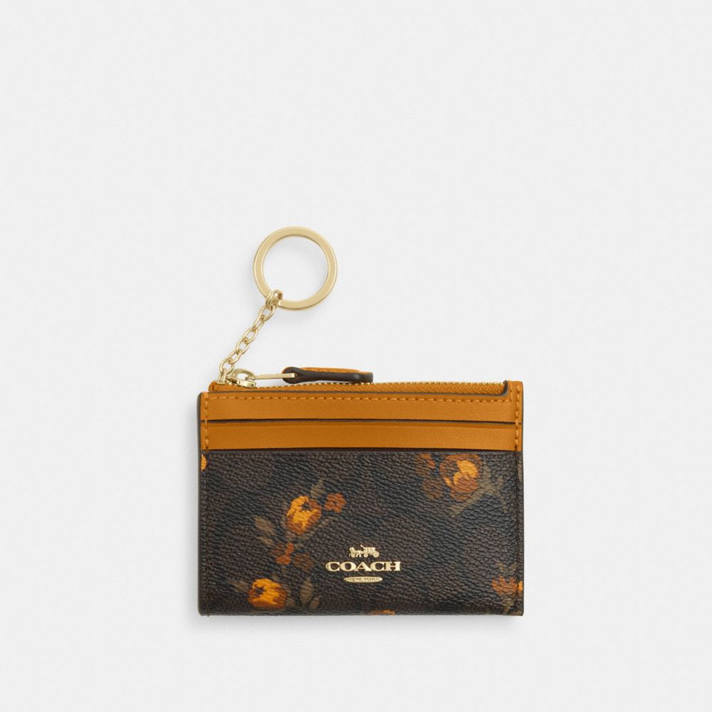 Coach Mini Skinny Id Case In Signature Canvas With Floral Print Im Walnut Yellow
