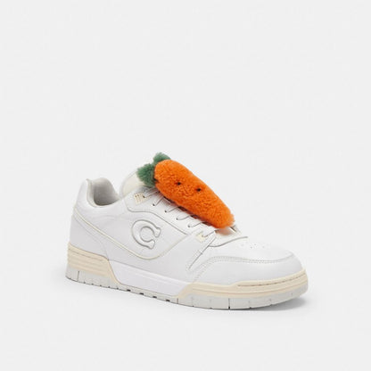 Coach Carroty Shoe Charm In Shearling Carrot