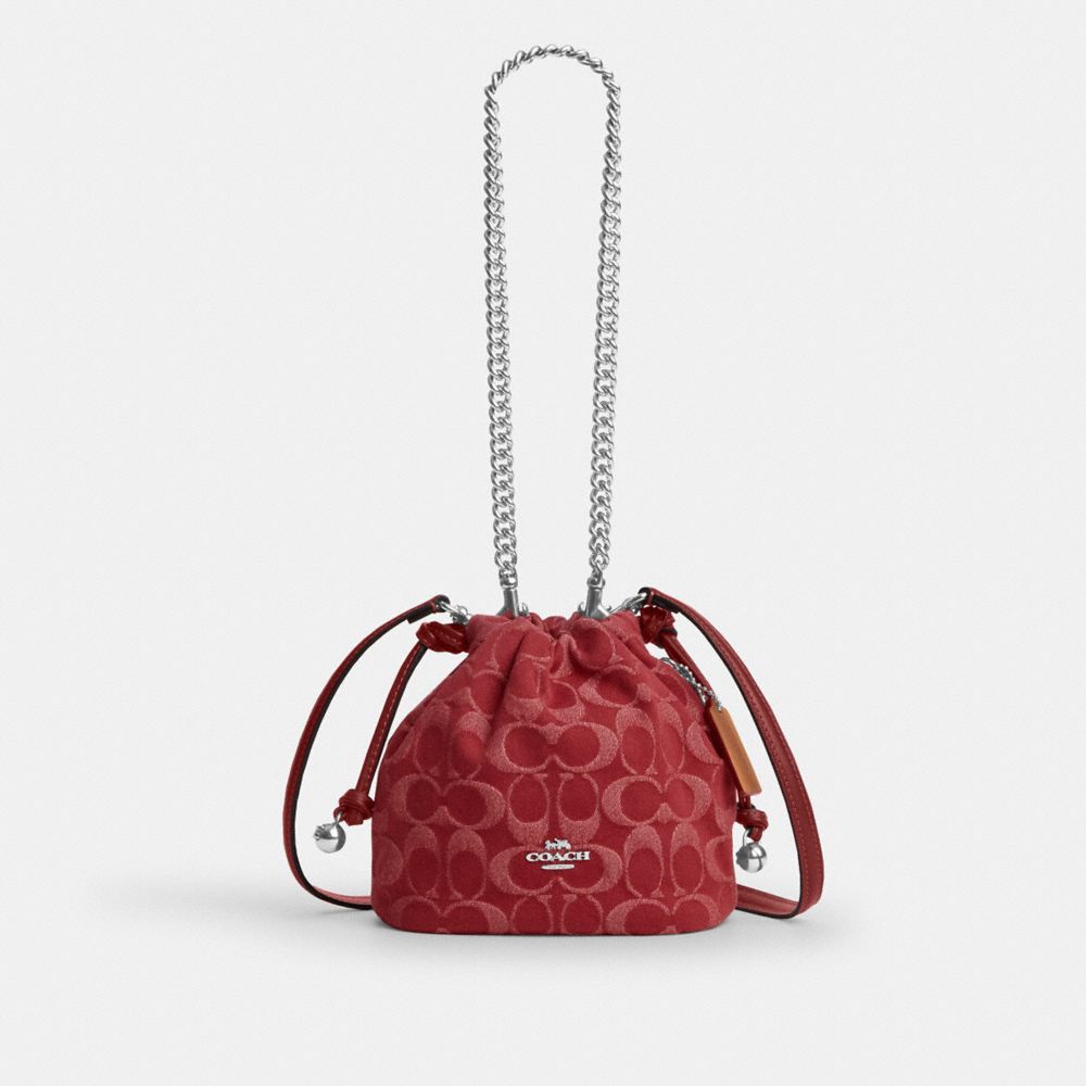 Coach Faye Mini Drawstring Bag In Signature Denim Silver True Red