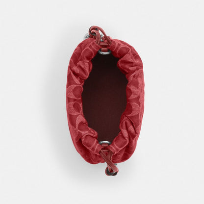 Coach Faye Mini Drawstring Bag In Signature Denim Silver True Red