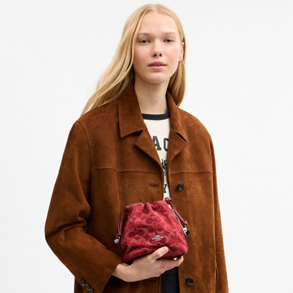 Coach Faye Mini Drawstring Bag In Signature Denim Silver True Red