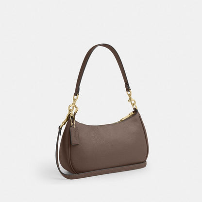 Coach Teri Shoulder Bag With Rivets, gold tone hardware and rivet detail
