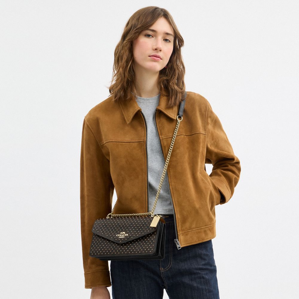 Coach Klare Envelope Crossbody Bag In Signature Canvas With Rivets Gold Walnut Black Multi