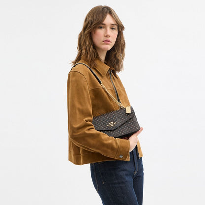 Coach Klare Envelope Crossbody Bag In Signature Canvas With Rivets Gold Walnut Black Multi