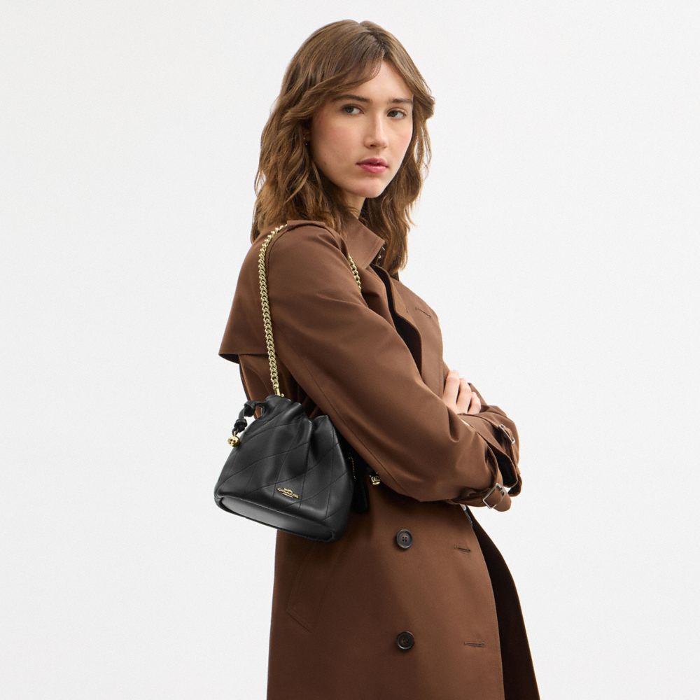 Coach Faye Mini Drawstring Bag With Quilting Gold Black