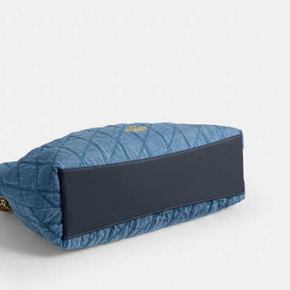 Coach Evelyn Shoulder Bag In Regenerative Cotton With Quilting Gold Indigo