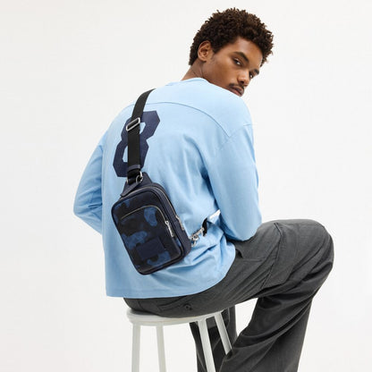 Coach Racer Sling Pack In Signature Camo Print Silver