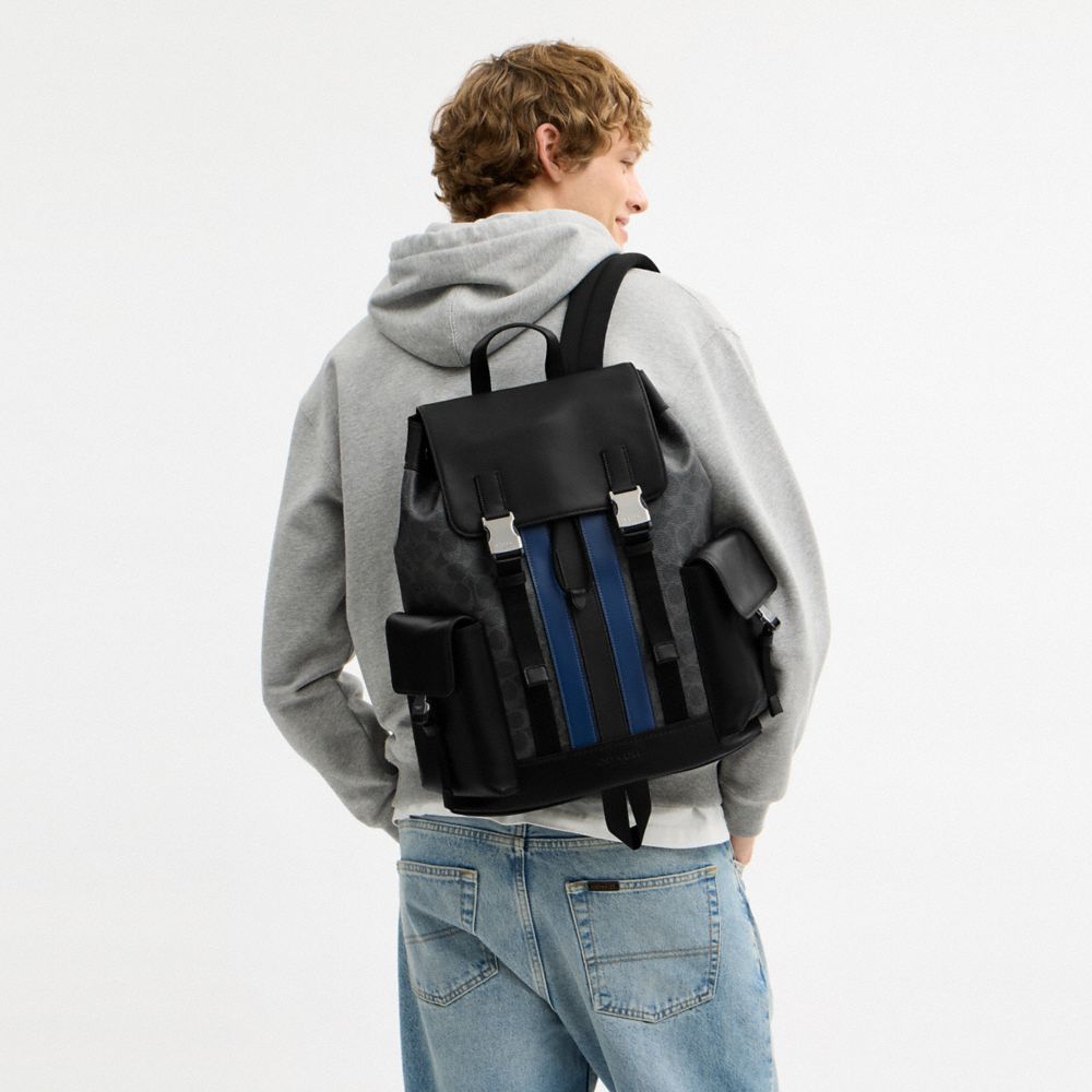 coach backpack with blue white stripe Coach Clark Backpack In Signature Canvas With Varsity Stripe Silver Black Multi – Kicks Machine