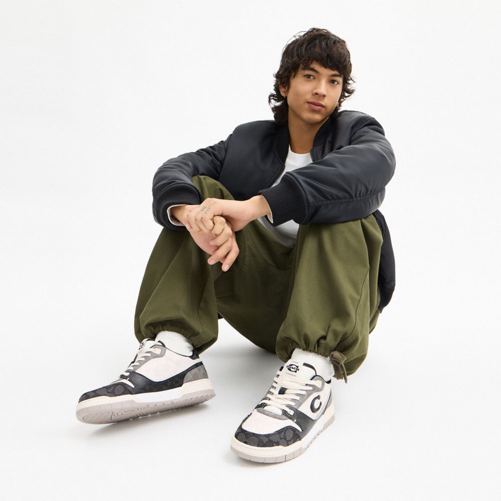 Coach Soho Sneaker In Mixed Signature Black Chalk