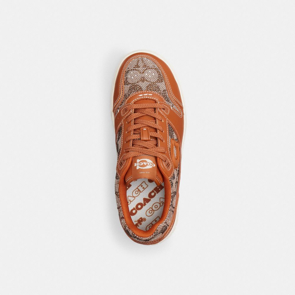 Women's Coach Soho Sneaker In Crystal Signature Jacquard Cocoa Burnished Amber