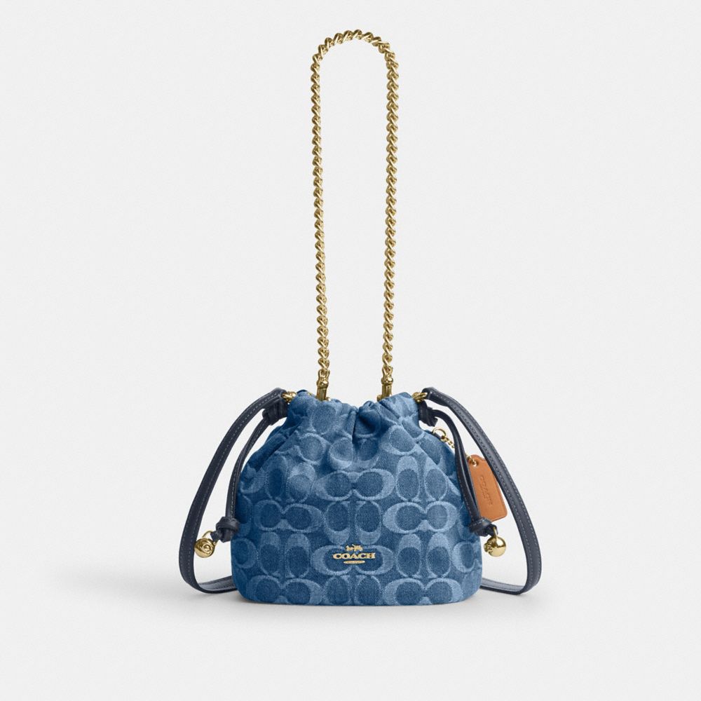 Coach Faye Mini Drawstring Bag In Signature Denim Gold Indigo