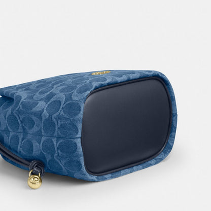 Coach Faye Mini Drawstring Bag In Signature Denim Gold Indigo