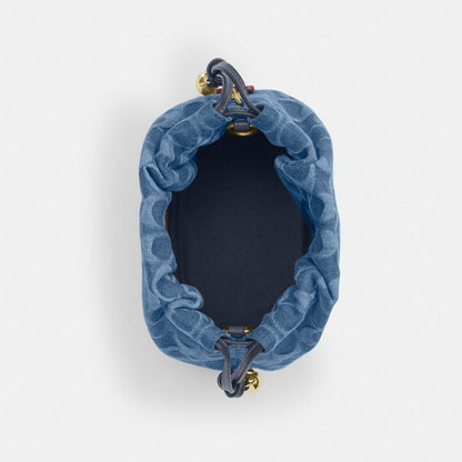 Coach Faye Mini Drawstring Bag In Signature Denim Gold Indigo
