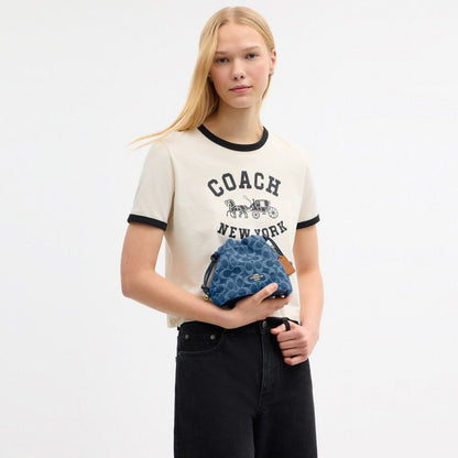 Coach Faye Mini Drawstring Bag In Signature Denim Gold Indigo