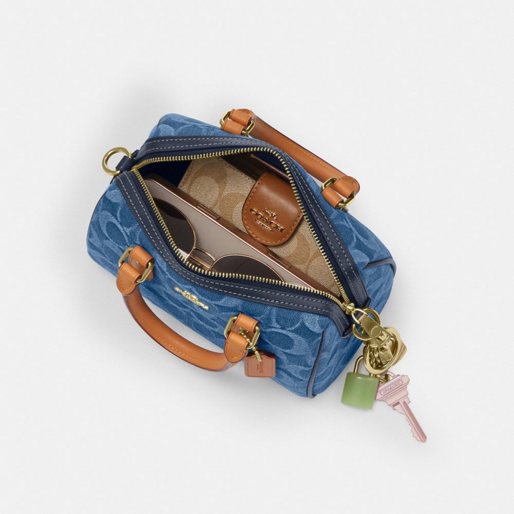 Coach Mini Rowan Crossbody Bag In Signature Denim Gold Indigo