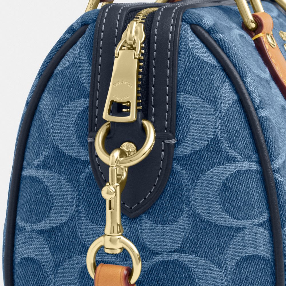 Coach Mini Rowan Crossbody Bag In Signature Denim Gold Indigo