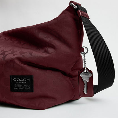 Coach Leo Crossbody In Signature Nylon Light Maroon
