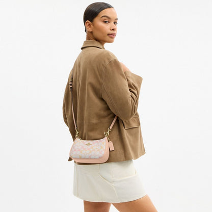 Coach Teri Mini Crossbody Bag In Signature Canvas Gold Chalk Pink