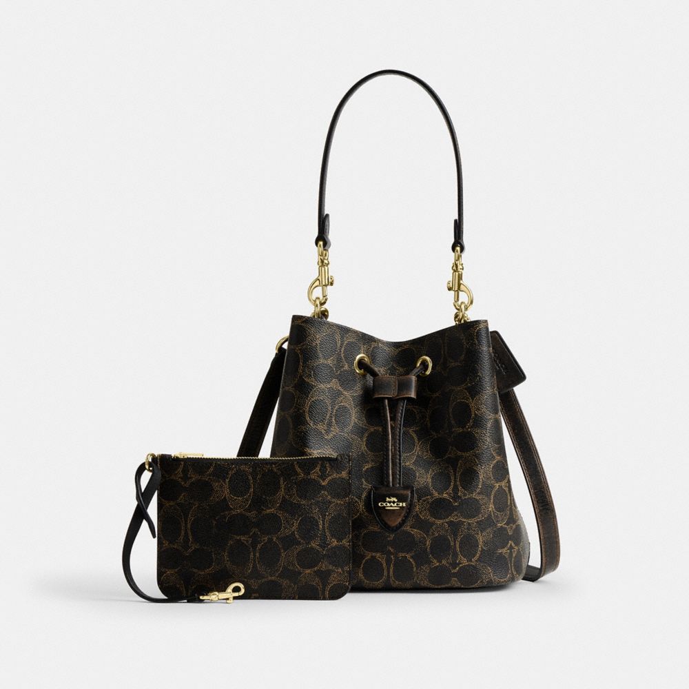 Coach Rowan Bucket Bag In Loved Signature Canvas With Charms Gold Brown