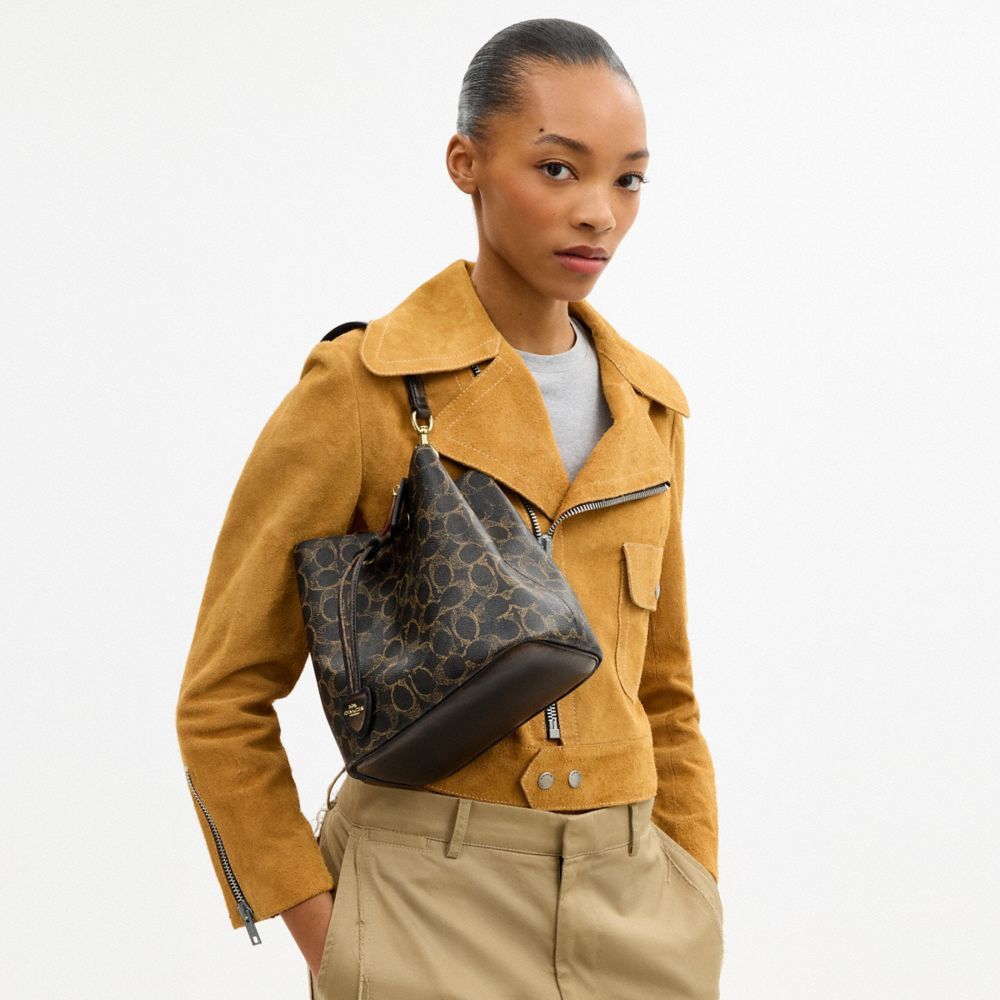 Coach Rowan Bucket Bag In Loved Signature Canvas With Charms Gold Brown