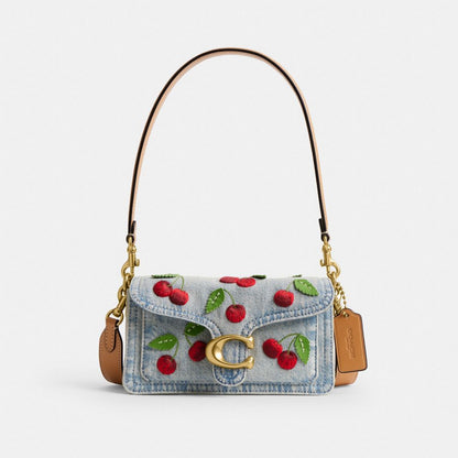 Coach Tabby Shoulder Bag 20 with cherry embroidery on denim front view